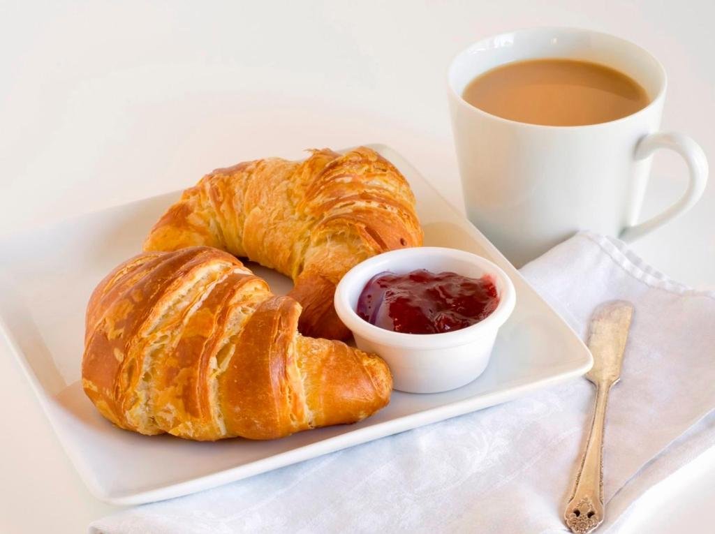 Colazione in camera Albergo Parigi Genova con caffè e cornetti